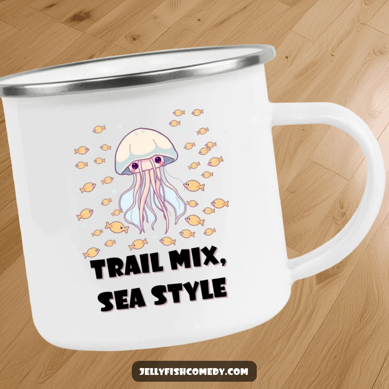 Funny camping mug featuring a happy jellyfish drifting through a school of tiny fish, perfect for drinks outdoors.