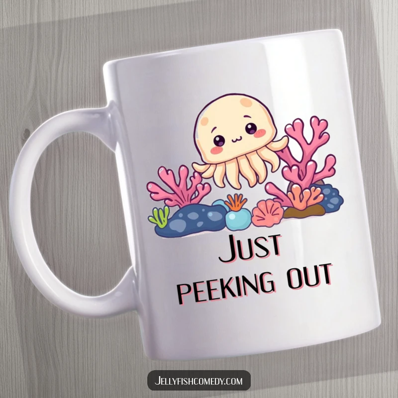 Funny mug featuring a curious jellyfish peeking playfully from behind a colorful coral reef, with wide, innocent eyes.