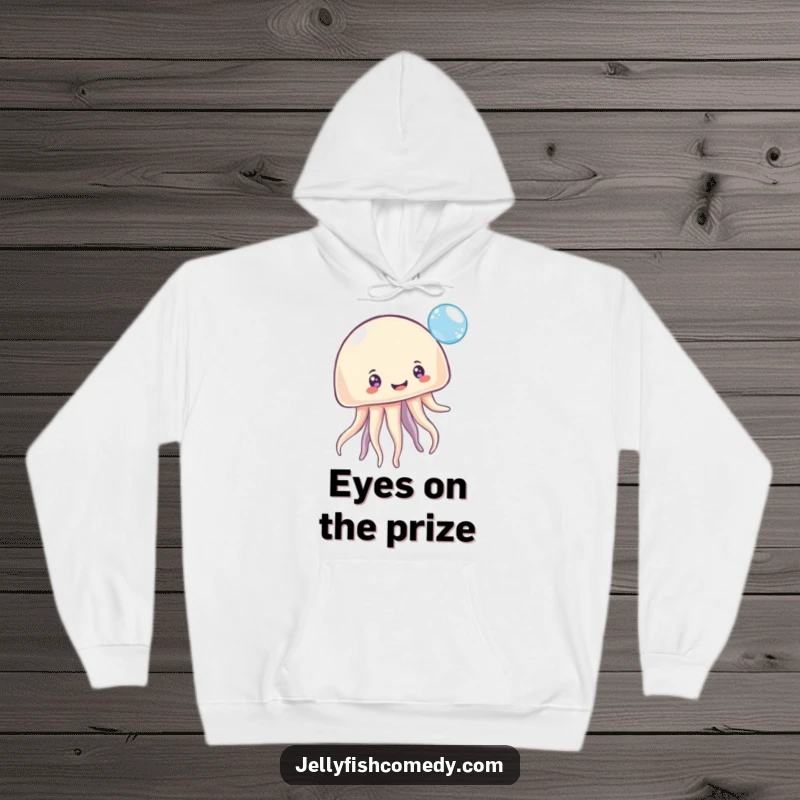 Funny Hoodie: A delightful jellyfish with many smiling eyes is captured mid-bounce, playing with a sparkling bubble, perfect for cozy humor.