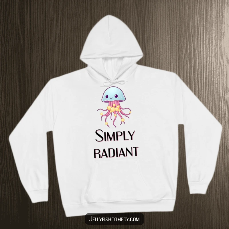 Funny hoodie featuring a jellyfish delicately balancing glowing sea pearls, perfect for cozy, magical moments.