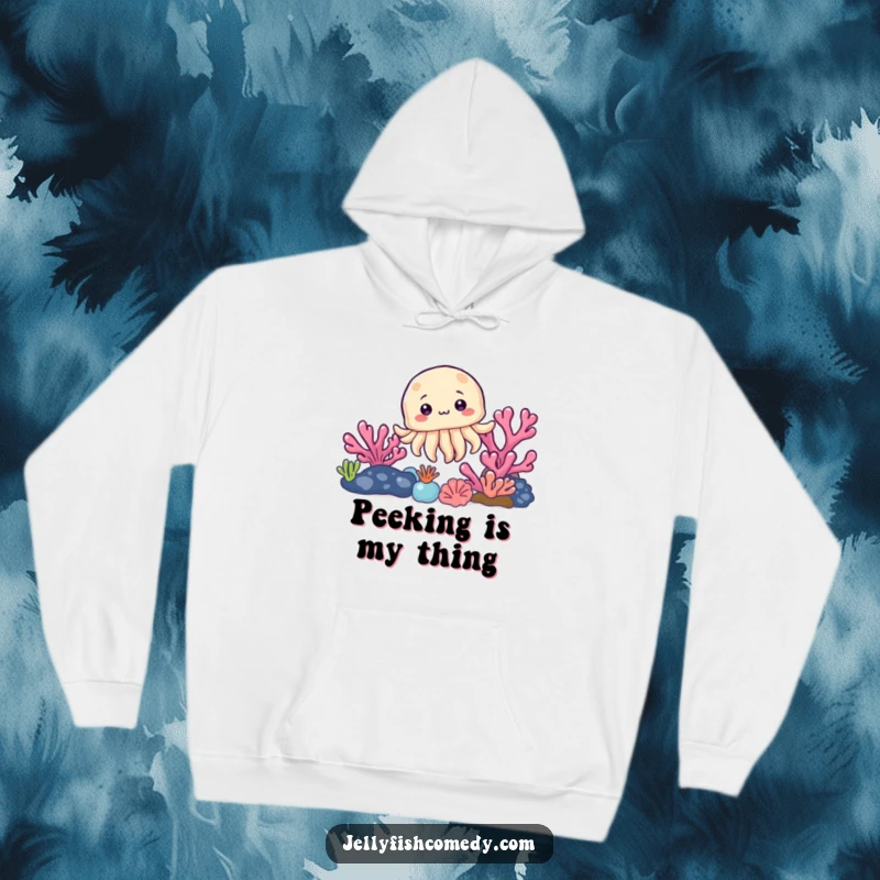 Funny and warm hoodie featuring a curious jellyfish peeking from behind a colorful coral reef, perfect for ocean lovers.