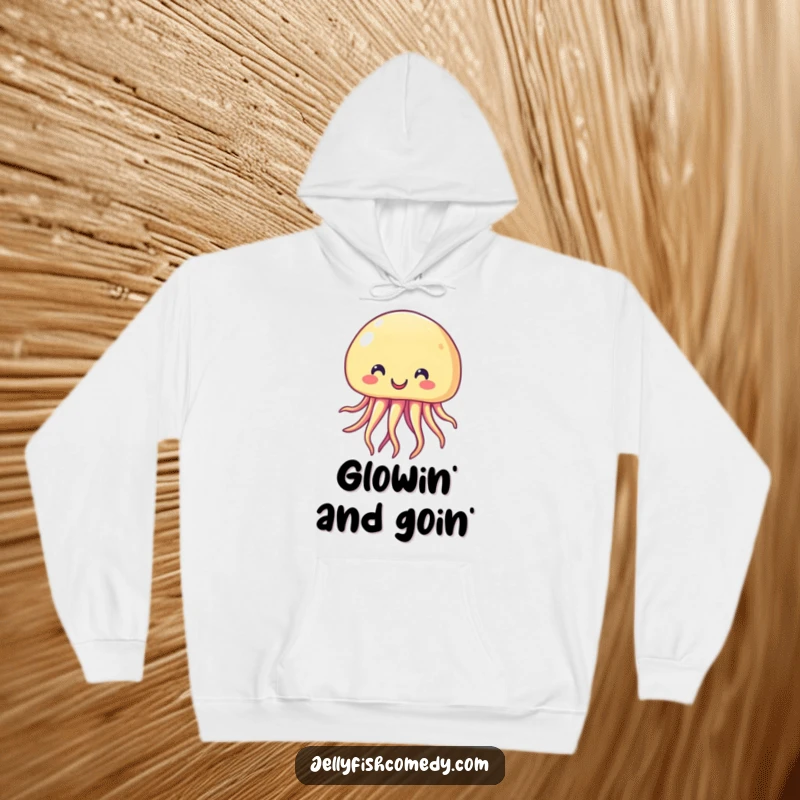 Funny Hoodie with a beaming, wide-smiling jellyfish character radiating happiness and warmth. This cozy apparel is a humorous delight.