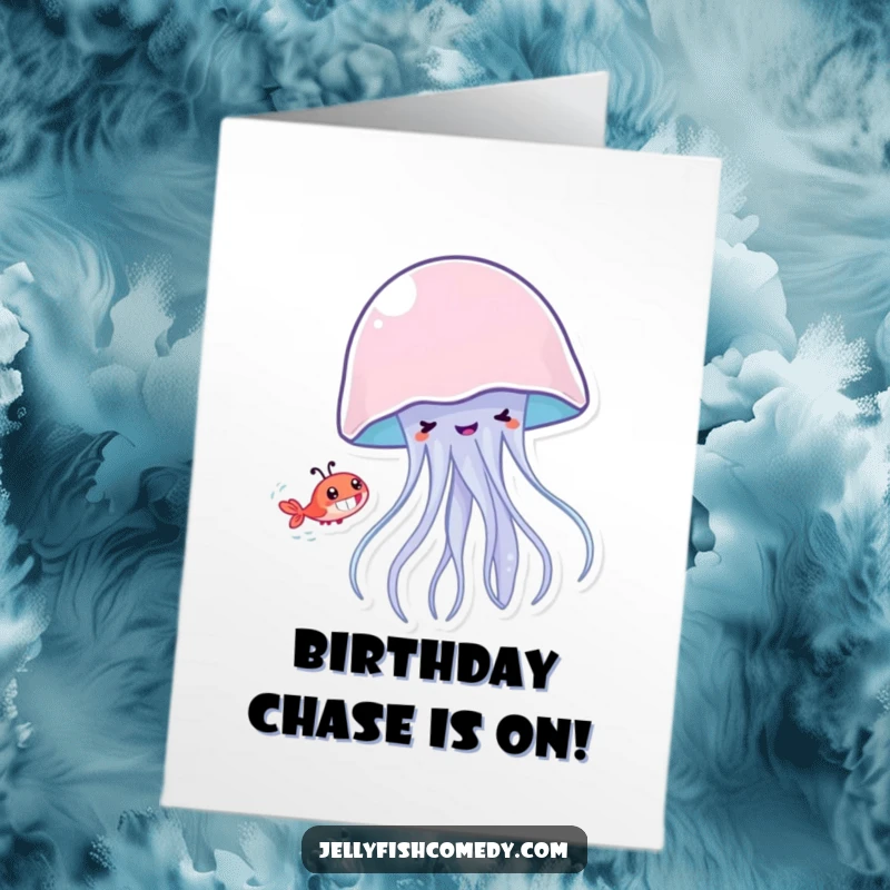 Funny Free Printable Birthday Card: Playful Jellyfish with a big grin chases a tiny shrimp, spreading birthday cheer.