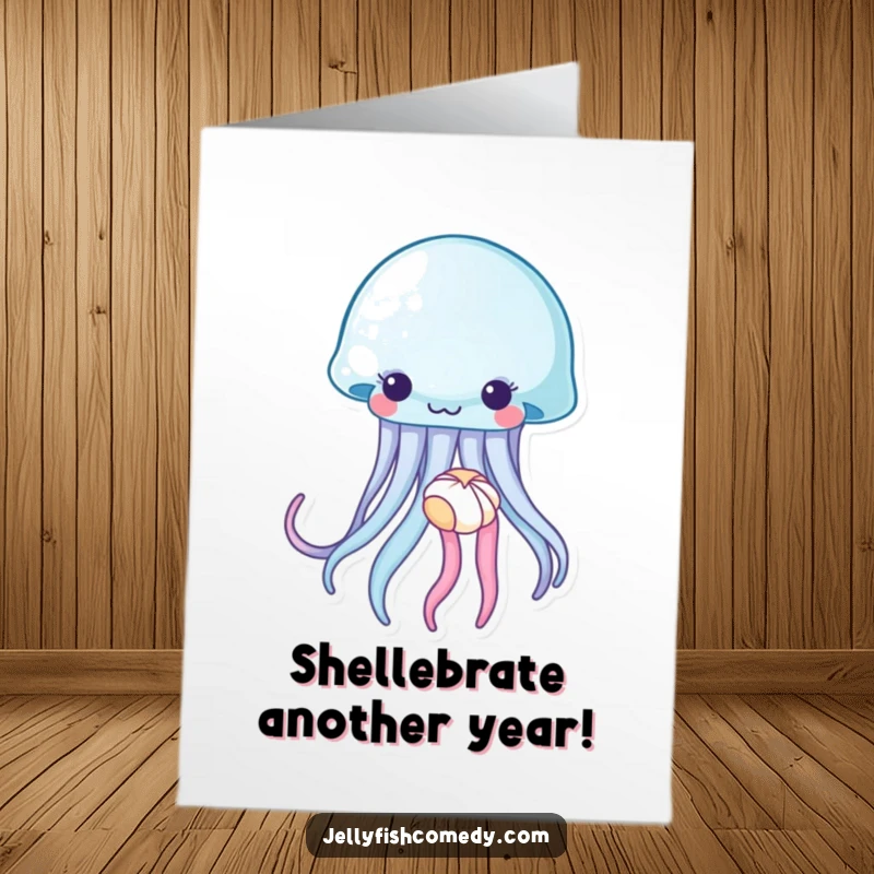Funny Free Printable Birthday Card: A jellyfish gently holding a tiny seashell with its tentacles, offering birthday wishes.