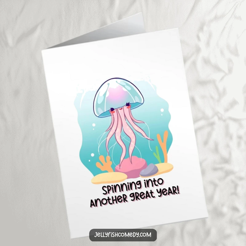 Free Printable Birthday Card: Jellyfish gracefully spinning in an underwater current, a beautiful and downloadable greeting.