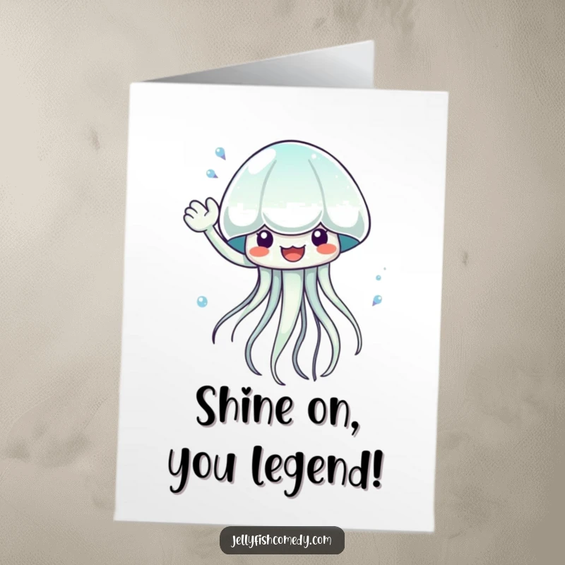 Funny Free Printable Congratulations Card: a jellyfish happily waves a stream of shimmering water to celebrate a big win.