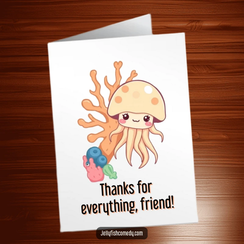 Funny free printable thank you card: A cute kawaii jellyfish peeks from behind coral, offering a delightful and funny thank you.