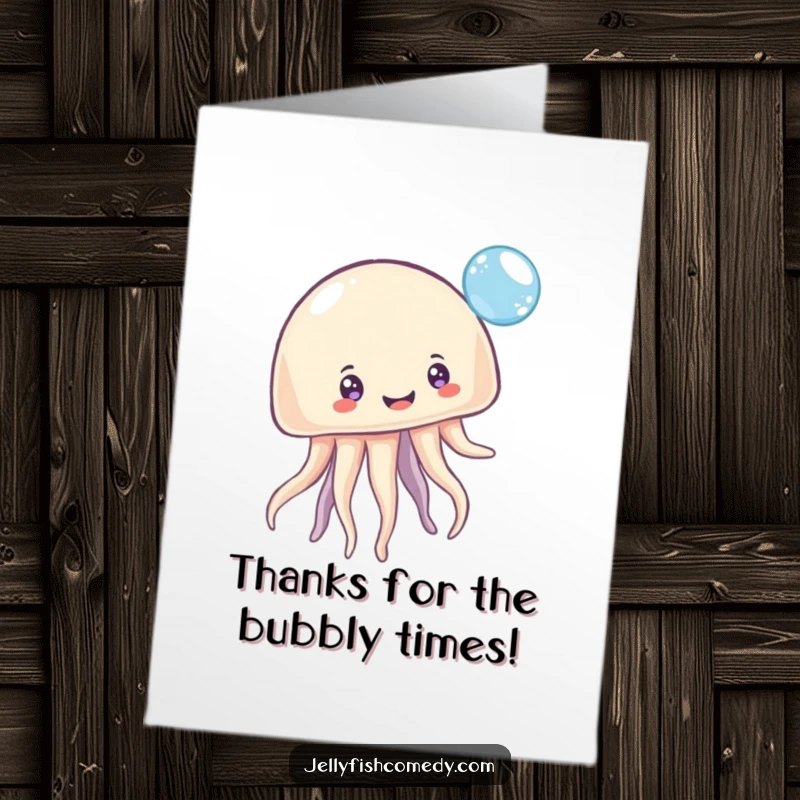 Funny Free Printable Thank You Card showcasing a happy, multi-eyed jellyfish playfully bouncing a sparkling bubble with thanks.
