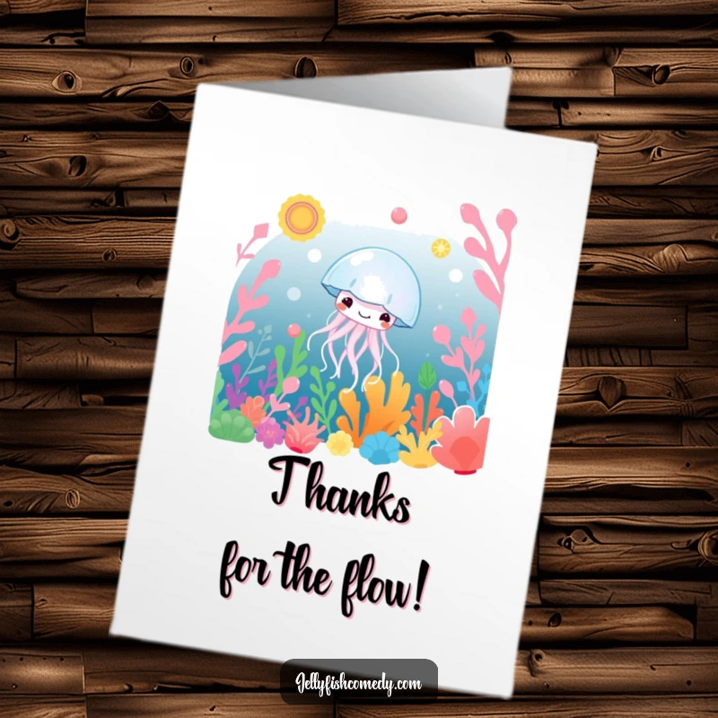 Free Printable Thank You Card depicting a content jellyfish gently floating amidst lush, colorful underwater flora.