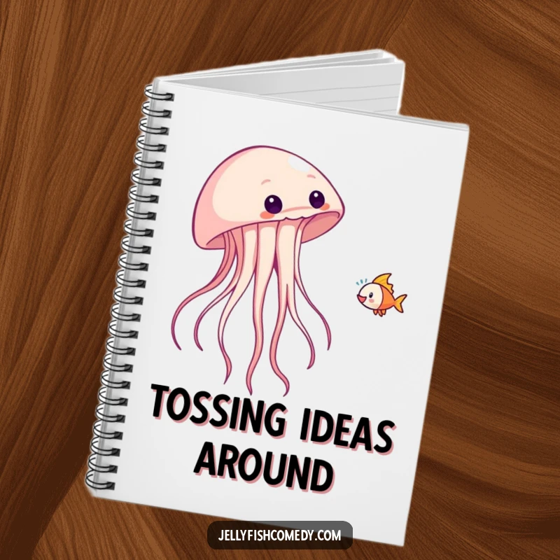 Funny notebook with a jellyfish playfully tossing a fish, ideal for jotting down fun ideas.